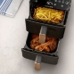 Dvonivojski Airfryer družinske velikosti omogoča enostavno pripravo do 1,4 kg krompirčka, 2 kg zelenjave ali 24 piščančjih beder